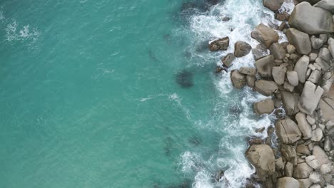 waves crashing against rocks