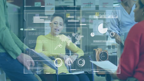 animation of graphs, loading circles, bars, diverse handicap woman discussing reports with coworkers