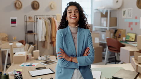 designer woman, arms crossed and face at workshop