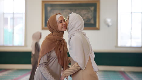 muslim women hugging in a mosque