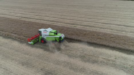 claas combine harvester harvesting wheat field