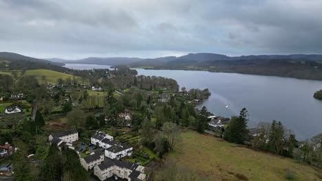 Aerial-Elevated-view-of-Windermere-and-the-town-of-Bowness-Lake-District-England