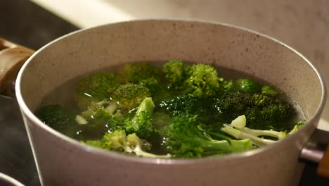 boiling broccoli in a pot
