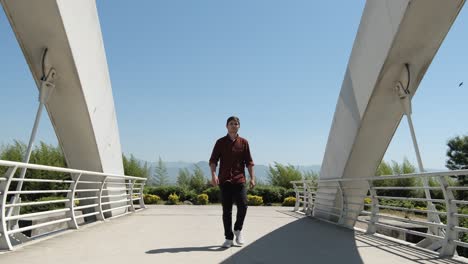 walking across bridge