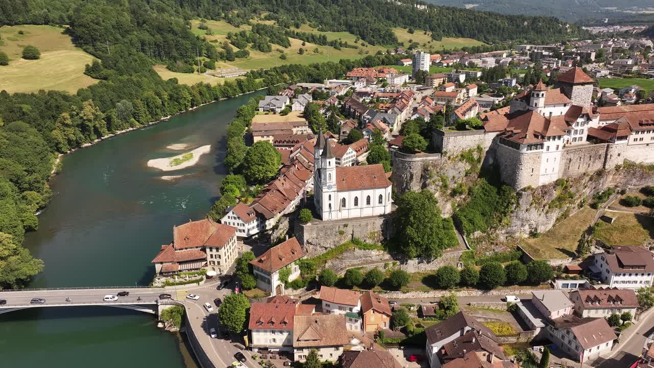 Wide aerial view of Aarburg Castle and church above the Aare River in Switzerland