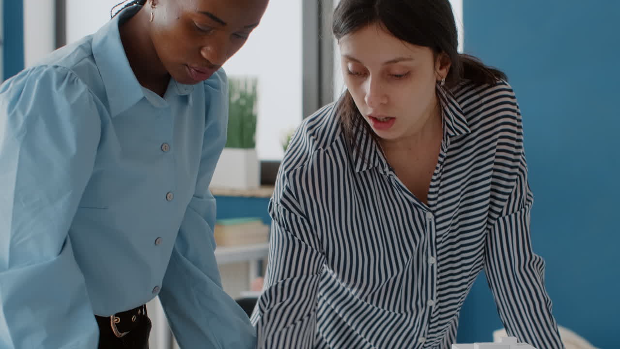 Architects collaborating on a building design