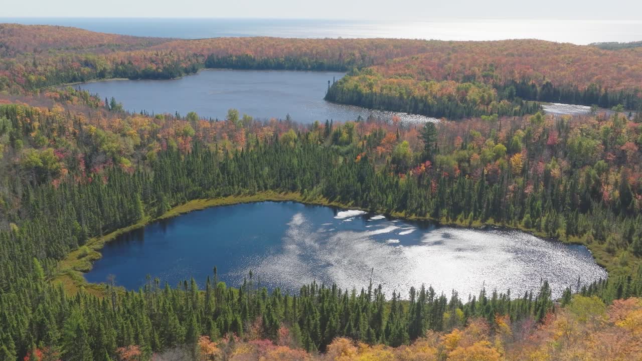 Autumn Colors Reflected in the Calm Waters of Lake Agnes Landscape