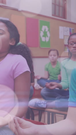 animation of lights over diverse pupils practicing yoga at school