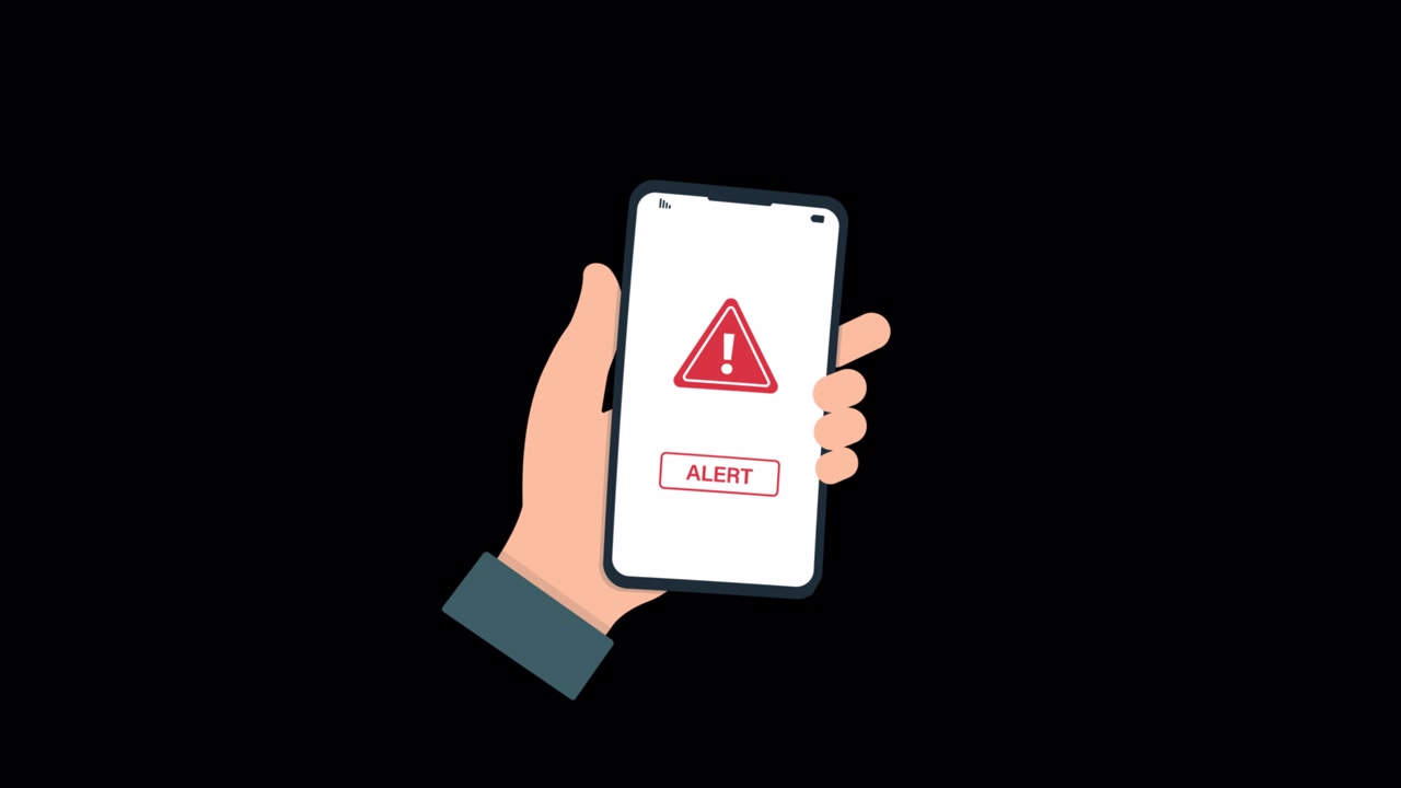 Hand Holding Smartphone Displaying Alert Notification