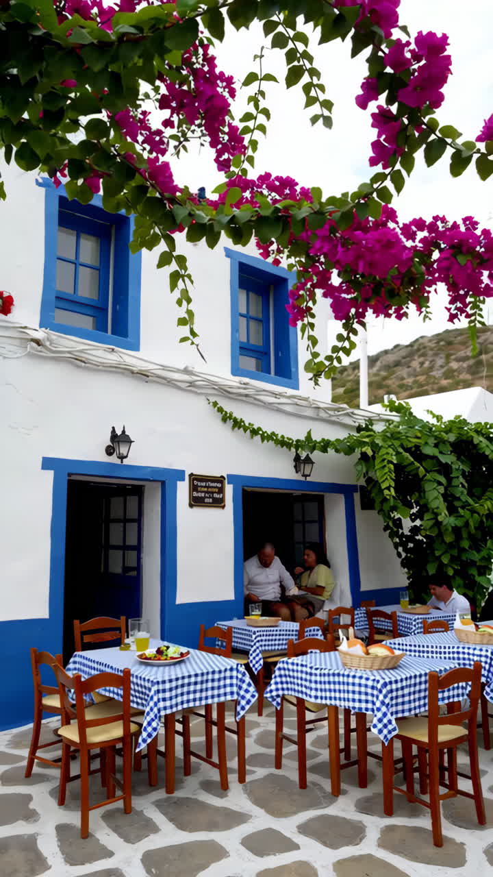 Authentic Greek Restaurant Experience with Grilled Seafood and Bougainvillea Decor