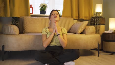 young woman praying to god.