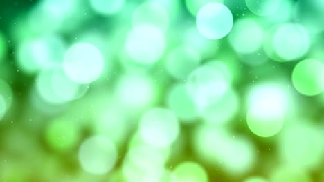 fondo de partículas abstractas desfocalizadas de 4k (verde) - video de stock de bucle