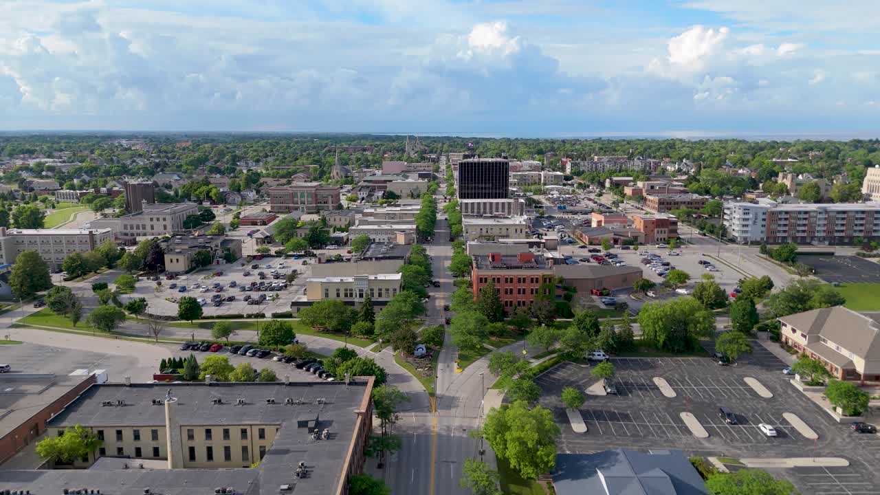Drone shot pushing in on Sheboygan, Wisconsin's S Eighth St