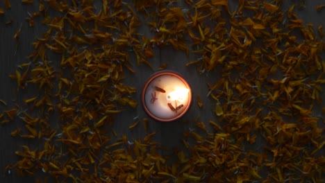 a lit diya or a tradition lamp used for various hindu festive celebrations for the festival of light- diwali and also for others like dussehra or prayers