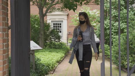 after months of restriction young woman wearing mask can finally enjoy fresh air