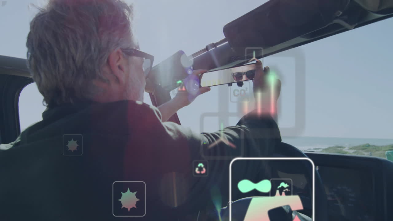 Man adjusting rearview mirror in convertible, displaying floating AR icons for automotive tech