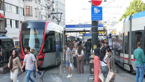 people waiting at a tram station in istanbul