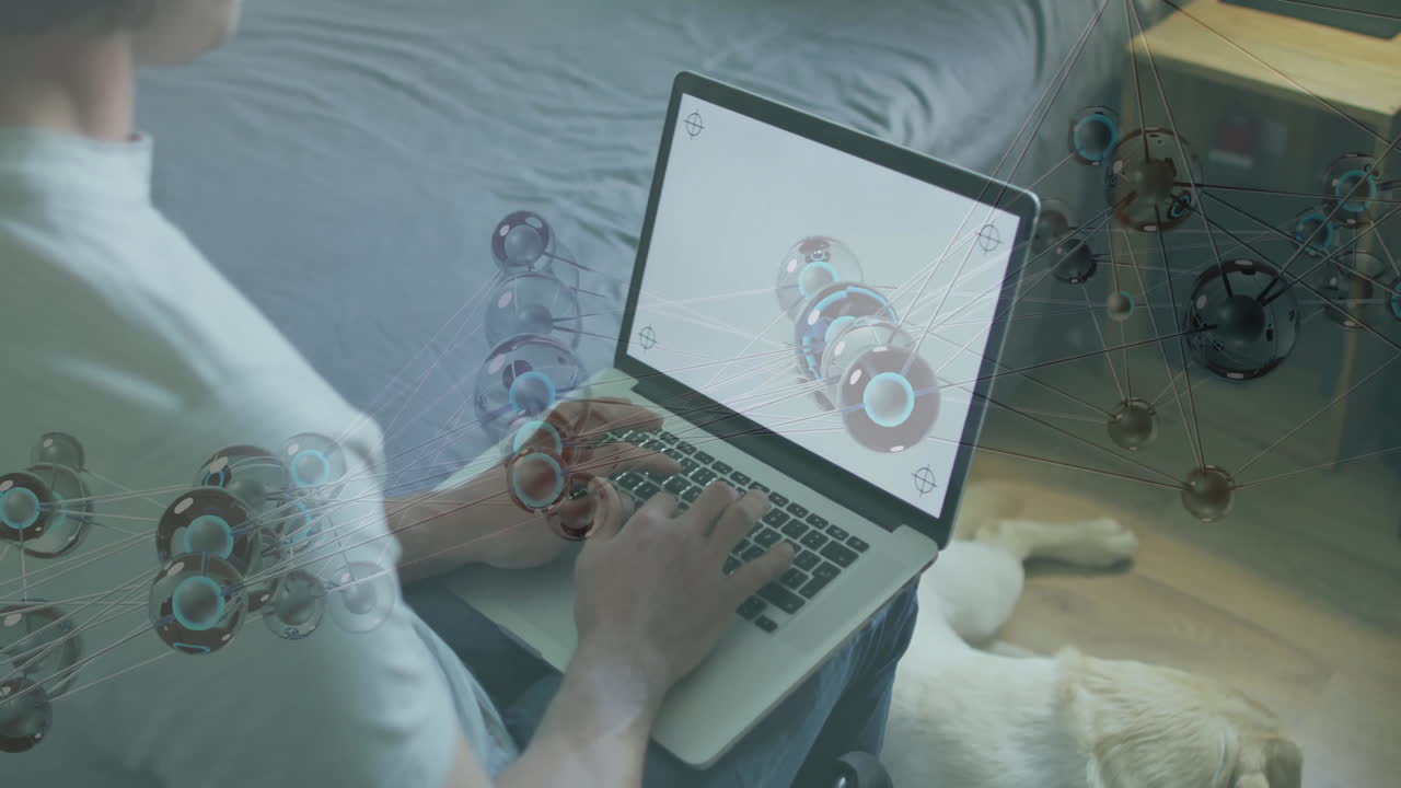 Using laptop, person viewing 3D molecular structures and animation in school