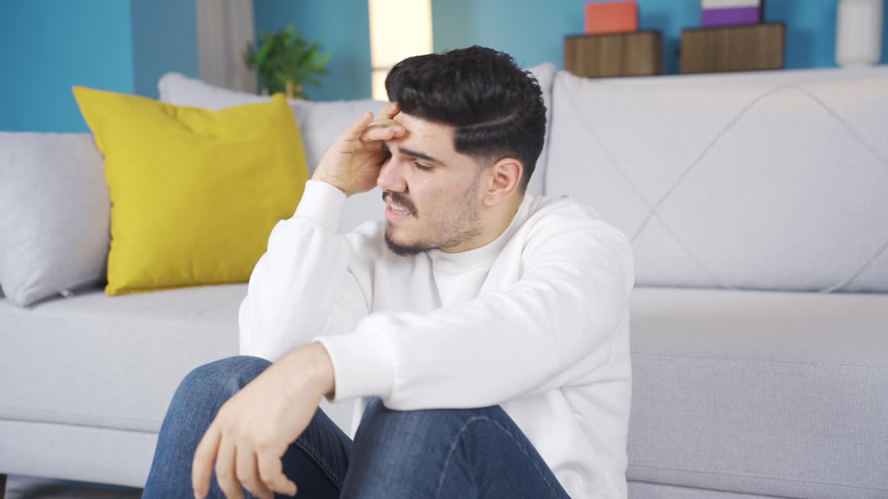 Jovem entediado. Deprimido