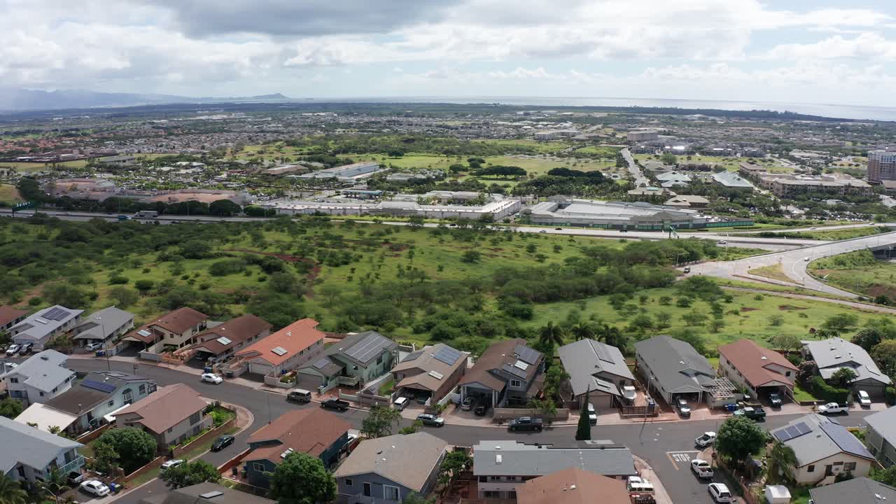 Wide panning aerial shot of the Kapolei suburbs in O'ahu, Hawaii