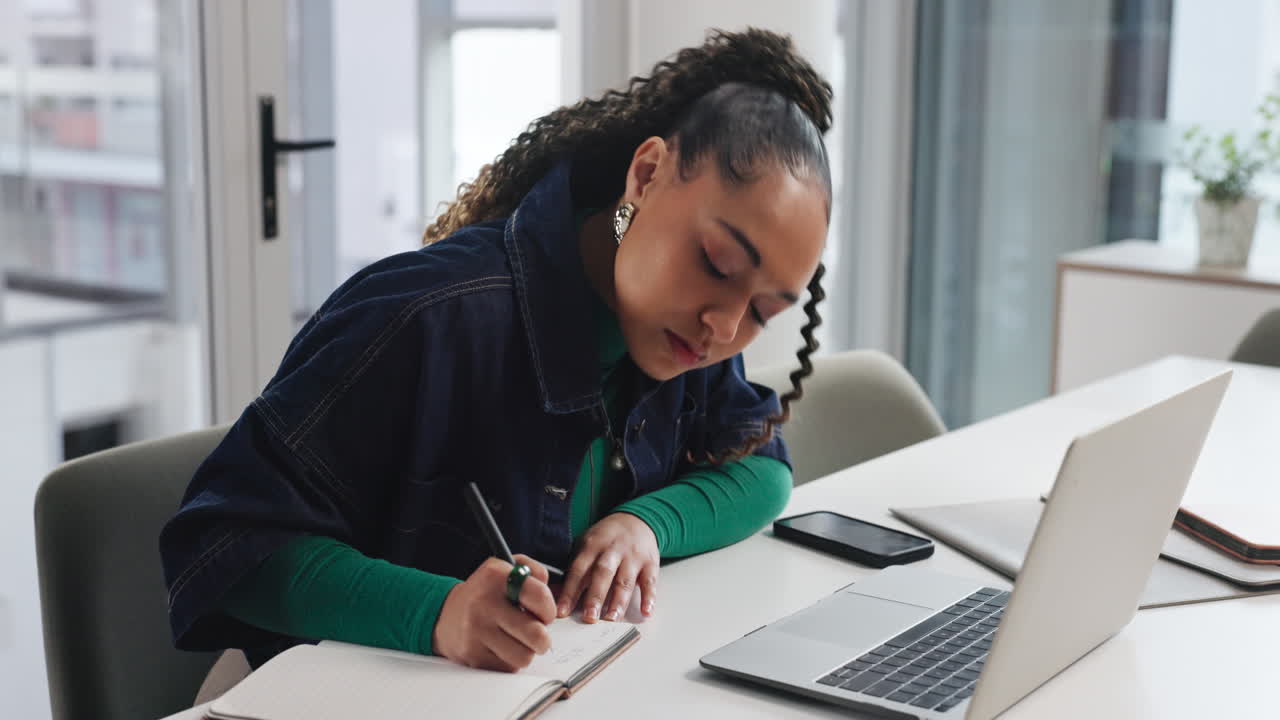 Woman working at desk in office