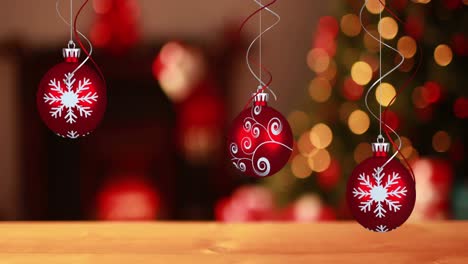 Animation-of-red-baubles-christmas-decoration-with-flickering-fairy-lights-on-christmas-tree