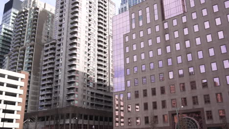 downtown buildings of non - descript city 4k day exterior