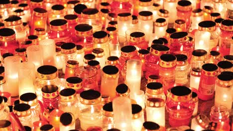 candlelight tribute fills night with warmth, remembrance on lāčplēsis day, riga