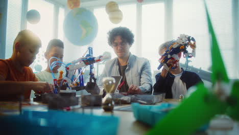 children learning robotics in class