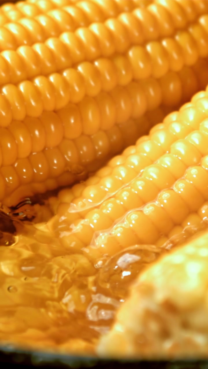 Close-up of Corn on the Cob Boiling in Hot Water