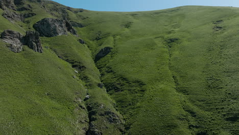 aerial - a ravine in the caucasus mountains, georgia, rising forward shot