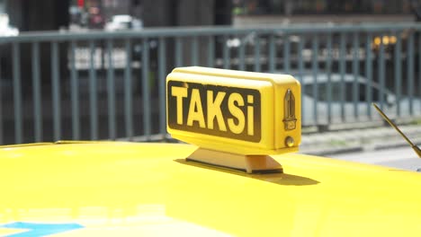 yellow taxi sign