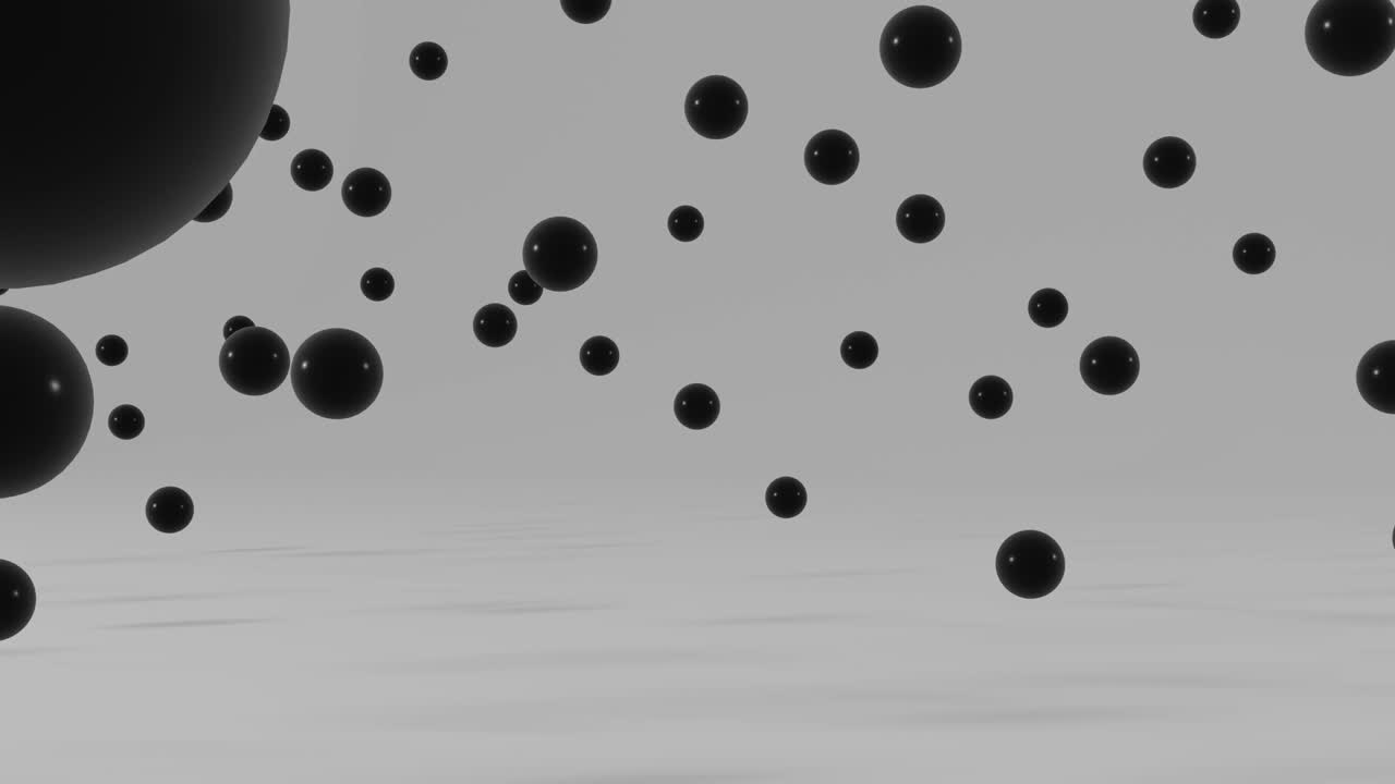 Black balls floating on a white background. Simple motion graphic seamless loop animation