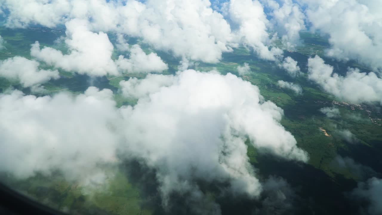 Many clouds high in the sky, airplane view high in the air