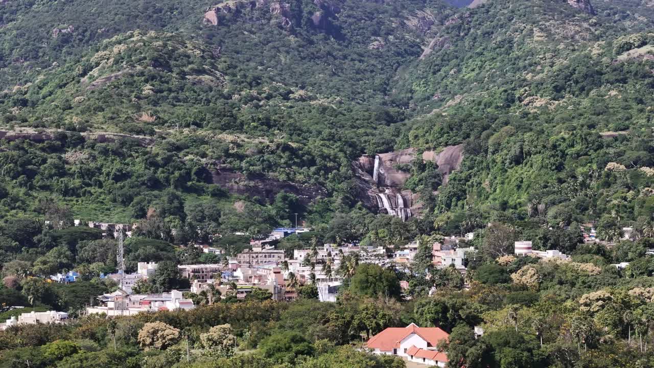 A breathtaking aerial panorama of Courtallam (Kutralam) in the Tenkasi district, Tamil Nadu, India, nestled at the base of the majestic Western Ghats