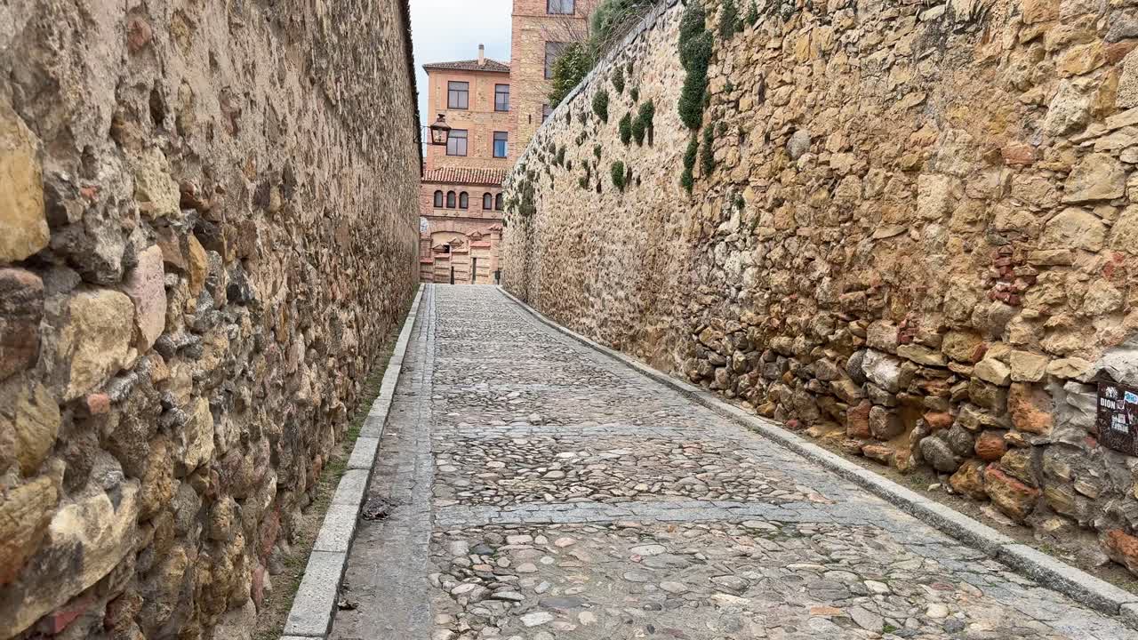 Old alley and stone walls in Segovia Cultural Center.