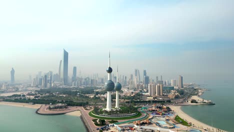 wide angle drone shot kuwait towers and city