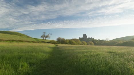 corfe castle on a summer's morning, slow zoom in