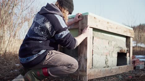 Diy-Hot-Tub,-Man-Screwing-Wood-Frame-Of-The-Tub-With-Cordless-Screw-Driver