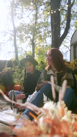 two friends enjoying a sunny autumn day