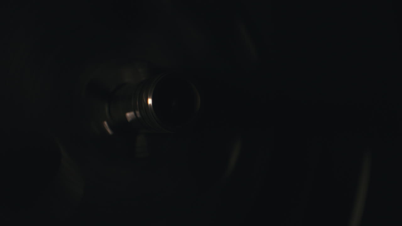 A vintage tape recorder in a blinking light