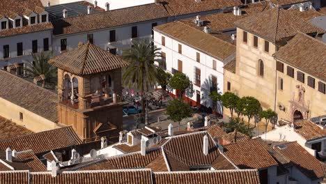 People-gathered-at-public-square-in-typical-Spanish-town