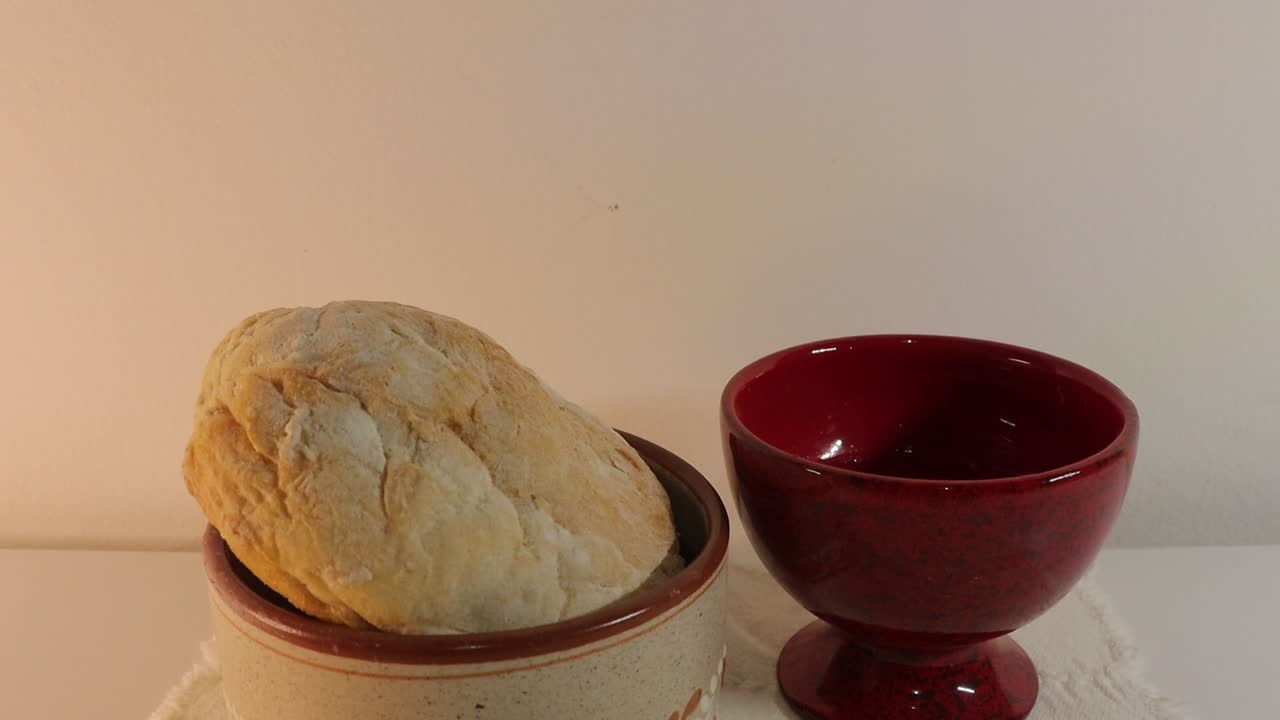 in the eucharist the love of jesus christ incarnate and transformed into bread and wine is presented from fraternity, community, love and hope. and the priest consecrates amazing love