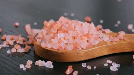 Himalayan-pink-salt-in-a-wooden-is-used-to-flavor-food.-Due-mainly-to-marketing-costs,-pink-Himalayan-salt-is-up-to-twenty-times-more-expensive-than-table-or-sea-salt.