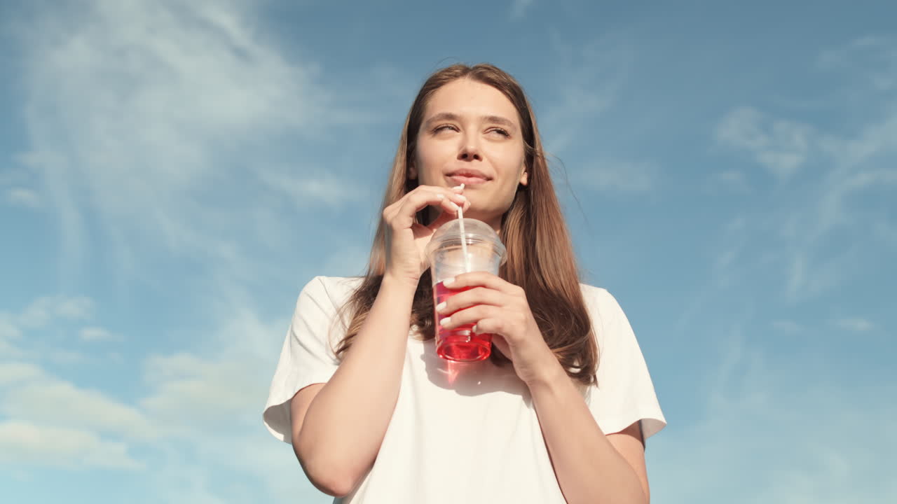 Young Caucasian Woman Drinking Soda