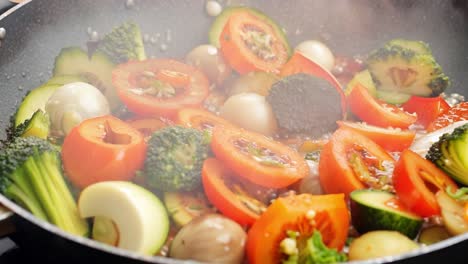 stir-fried vegetables cooking in a pan