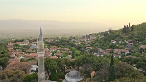 a village view with its mosque and renovated houses.