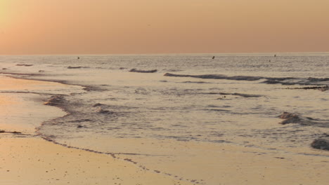 calming view of waves at sunset