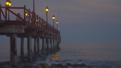 evening at a wooden pier in marbella, south of spain