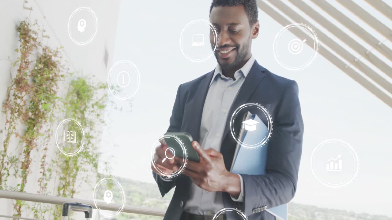 Animation of icons with data processing over african american businessman in office